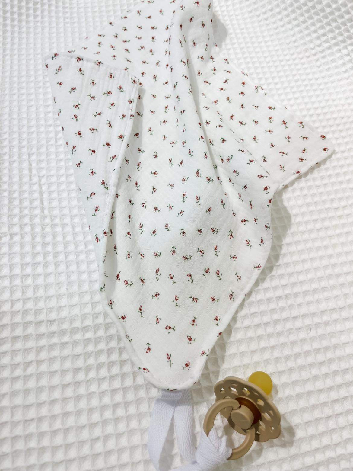 Mini comforter with pacifier clip