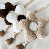 Attache-suce en peluche fleur